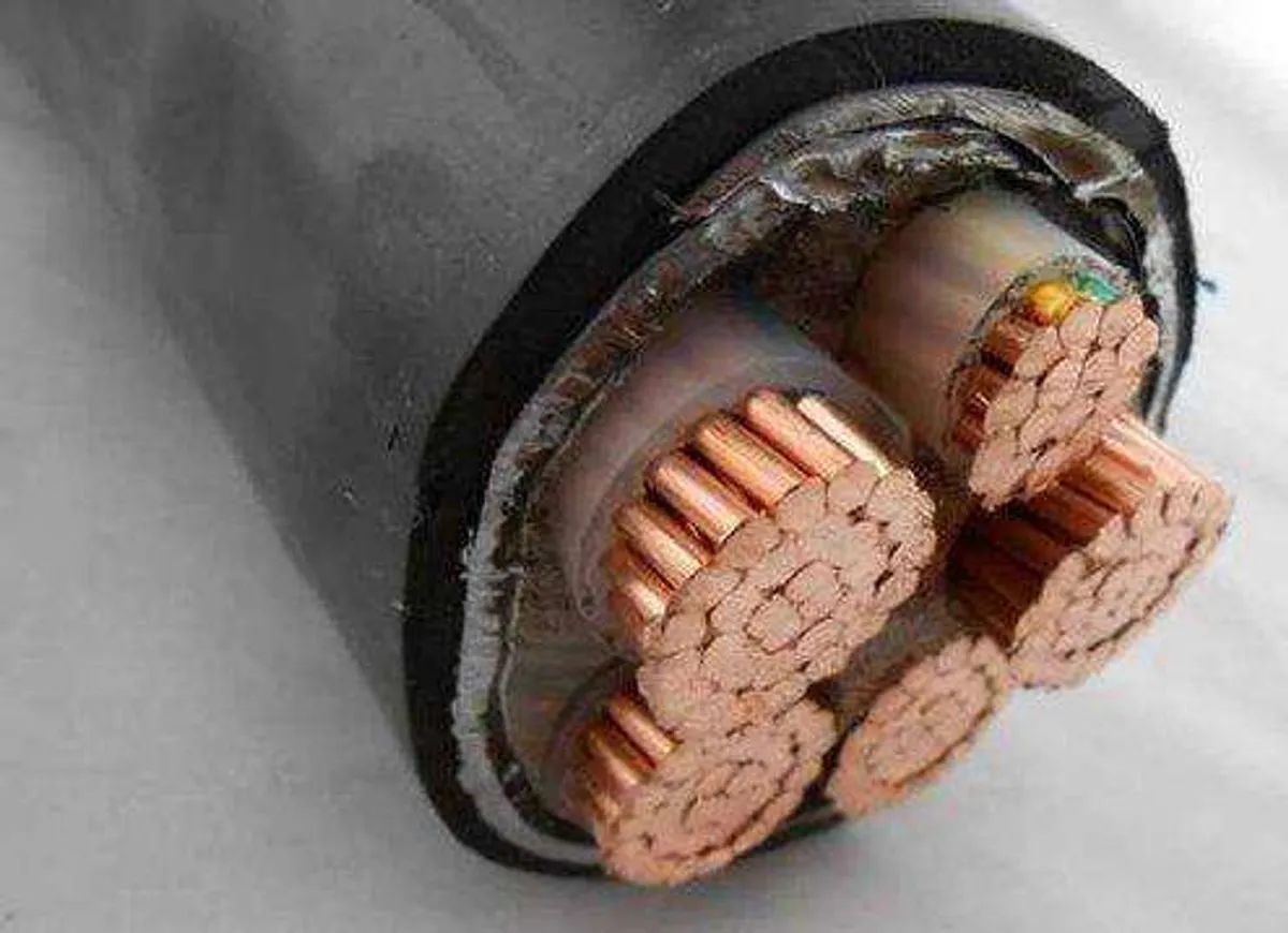 11kV XLPE insulated 3-core steel wire armoured medium voltage cable showing copper conductors, XLPE insulation layers, copper tape screen, and SWA