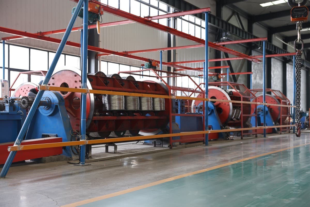 ACSR conductor production line in China factory showing stranding machines and wire drawing equipment