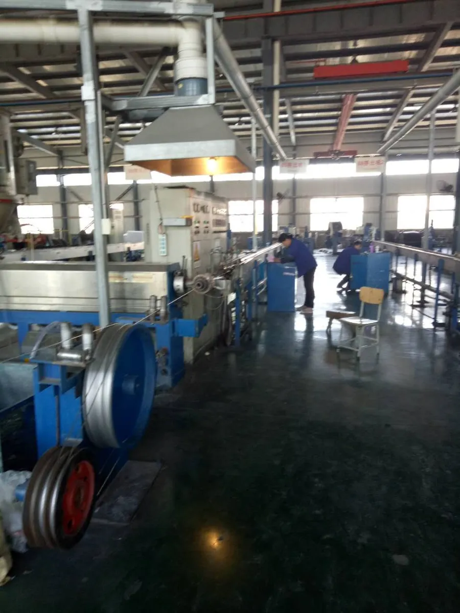 Cable extrusion line producing XLPE insulated 3 phase power cable with cross-linking chamber visible