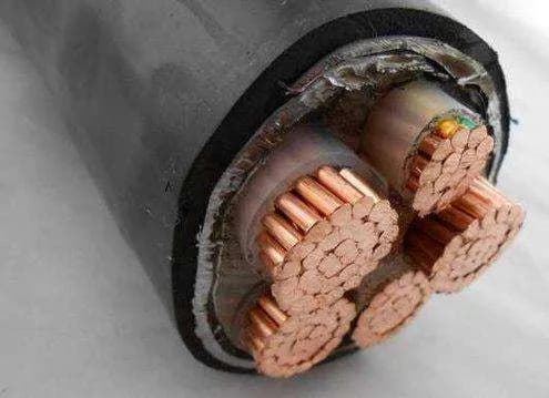 Cross-section of underground power cable showing conductor, insulation, armour and sheath layers